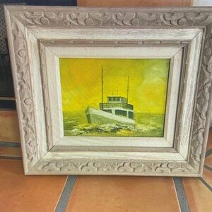 Original fishing boat painting with hand carved wood frame.